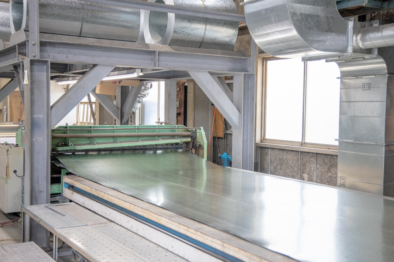 自動定寸切断装置